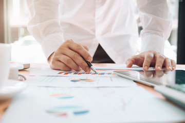 Office workplace with business finance, accounting,laptop on wood table.finance statistics and analytic research concept
