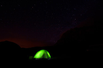 Fototapeta na wymiar Night Camping Under The Stars