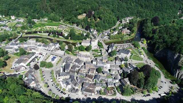 Aerial 4K footage of World heritage Durbuy Castle in Belgium, province of Luxembourg in the Wallonia region. Beautiful landscape with river, sunny weather during summer season.