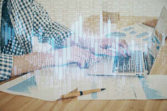 Multi exposure of stock market chart with man working on computer on background. Concept of financial analysis.
