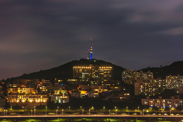 The skyline of Seoul, South Korea, along with the sunset at the Seoul Tower