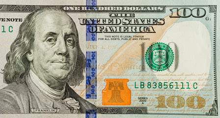 US 100 dollar bill close up, USA federal fed reserve note fragment.
