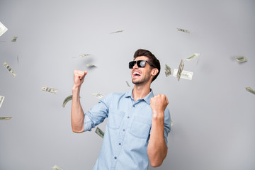 Photo of cheerful wealthy excited crazy freelance model wearing eyeglasses spectacles rejoicing...