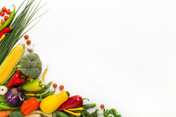 Vegetables creating a frame on white background