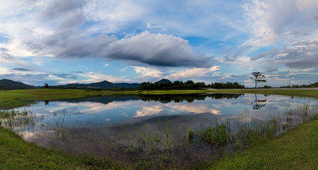 Fototapeta premium Amazing view of reflection lake in Boonrod farm, Chiangrai, Thailand.