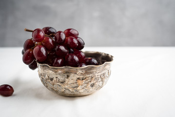 Painterly Grapes in a silver bowl like ancient times