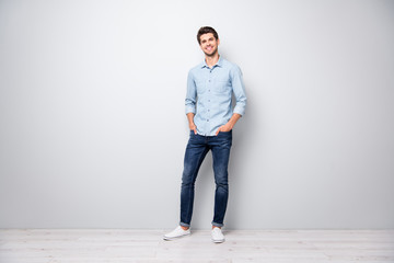 Full length photo of charming attractive guy from university college put hands in pockets stand...