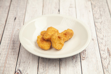 Chicken nuggets on a dish