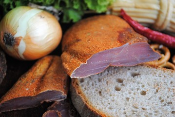 A plate of meat delicacies for beer. Craft production of meat snacks.
