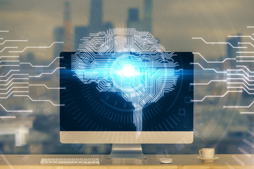 Double exposure of table with computer and brain hologram. Data innovation concept.