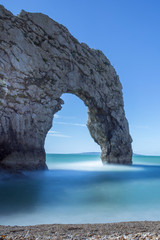 views of rock formations and beach at durdle dor