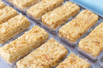 A lot of crispy fresh cakes Napoleon with condensed milk and puff pastry, background, torte
