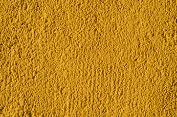 Fototapeta premium The wall closely. Plastered surface of the house.
