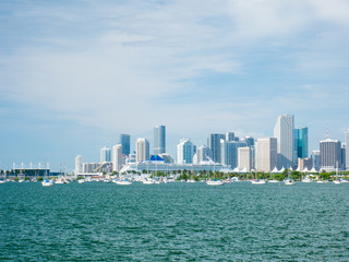 Fototapeta na wymiar view of Miami downtown skyline at sunny and cloudy day with amazing architecture