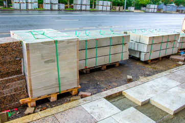 Repair of the sidewalk.Replacing tiles on the Alley.