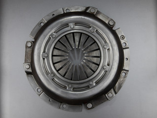 Clutch car basket on a gray background. Top view car service.