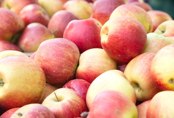 apples on the market. natural vitamins, homemade apples.