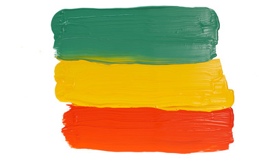 Colorful paints of primary colors red, yellow and green. a string of three colors of paint on a white background