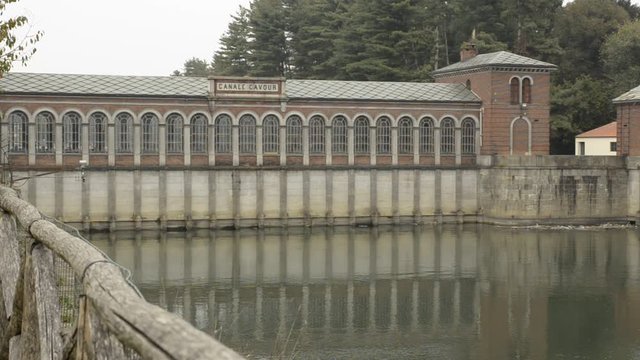 Chivasso, Piedmont, Italy. October 2019. The Cavour canal is a great work from the 1800s that captures the waters of the river Po. In the video the red brick sewer. Fixed framing.