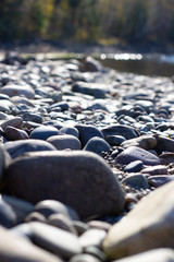 Fototapeta premium Stone Bank of a large river closeup