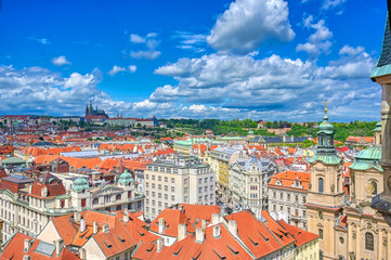 Naklejka na ściany i meble An aerial view of Prague, Czech Republic and Prague Castle on a sunny day.