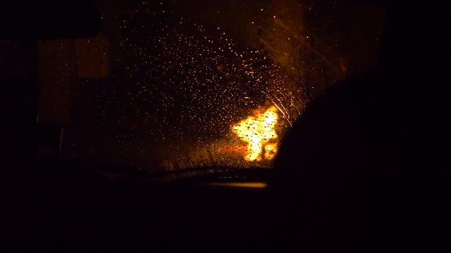 POV Through Glass, Bonfire Burning At Rainy Night, 60fpd