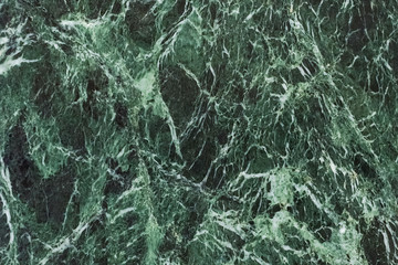 The dark green marble. Facing stone. Texture