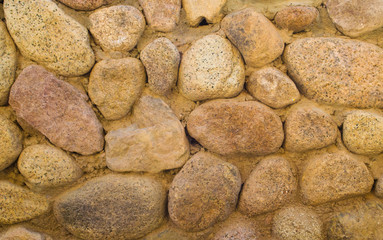 fence of stones close up. Background stone fence