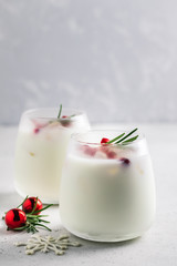 Festive pomegranate rosemary mocktail. Selective focus, space for text.