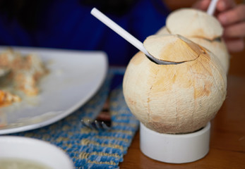 peeled coconut juice on eating table