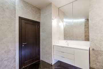 Fototapeta na wymiar Russia, Moscow- May 20, 2019: interior room apartment. standard repair decoration in hostel. modern bathroom, sink, decoration elements, toilet.