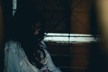 Fototapeta na wymiar Portrait of asian woman make up ghost face,Horror scene,Scary background,Halloween poster