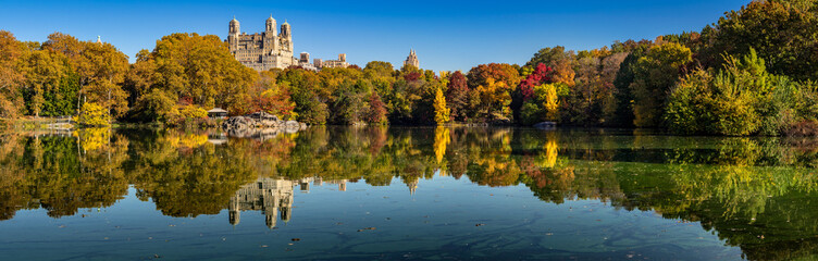 The Lake in Central Park with full autumn colors. Panoramic morning view on an early Fall morning. Upper West Side, Manhattan, New York City, NY, USA