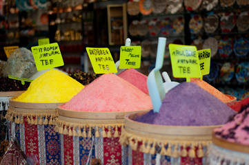 Multi-colored dried fruits and tea in the oriental bazaar.
