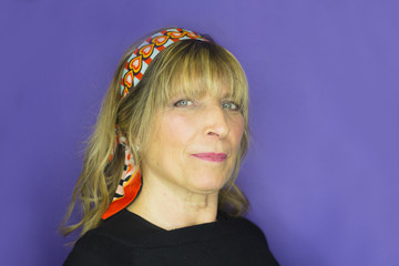 Portrait of blond woman with hippie look