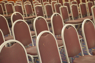 Fototapeta premium Group of brown chairs in rows