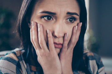 Closeup photo of pretty lady holding hands on cheeks very sad expression did big life mistake wish...