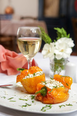Simple vegetarian dish - bell pepper stuffed with feta cheese