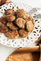 Top view of ready to eat meatballs with porcini mushrooms (edible Boletus)