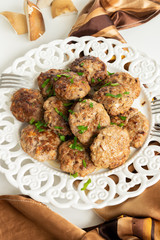 Top view of ready to eat meatballs with porcini mushrooms (edible Boletus)