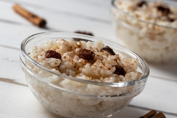 Delicious peruvian dessert arroz con leche, rice with milk, cinnamon and rises