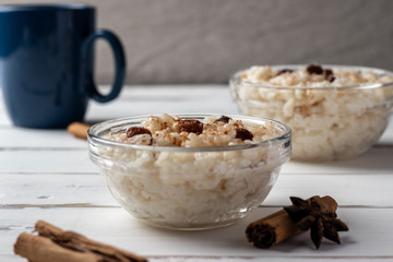 Delicious peruvian dessert arroz con leche, rice with milk, cinnamon and rises