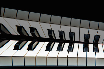 piano keys creative on black background