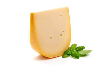 Traditional Dutch Gouda cheese, isolated on white background