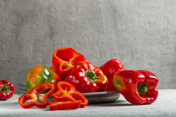 Sweet fresh red pepper with gray background