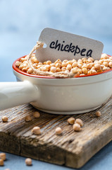Organic chickpeas in a ceramic bowl.