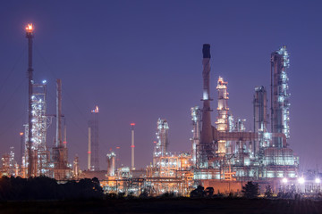 Fototapeta na wymiar Panorama wide-angle Large oil and gas refinery industrial area and beautiful lighting at Twilight.