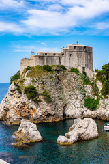 Fototapeta na wymiar View of Lovrijenac fortress (tower) and blue Adriatic Sea, Dubrovnik, Dalmatia, Croatia on sunny day. The building doubles as Red Keep in King's Landing, Game of Thrones