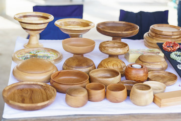 Beautiful wooden dishes are on the counter