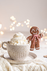 Gingerbread cookie man with a hot chocolate for Christmas holiday